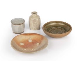 Phil Rogers (1951-2020) Four pieces to include a bowl, a plate, a vase, and a lidded jar each with