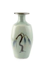 David Leach (1911-2005) Bottle vase with a willow tree in tenmoku and iron glaze, on a celadon glaze