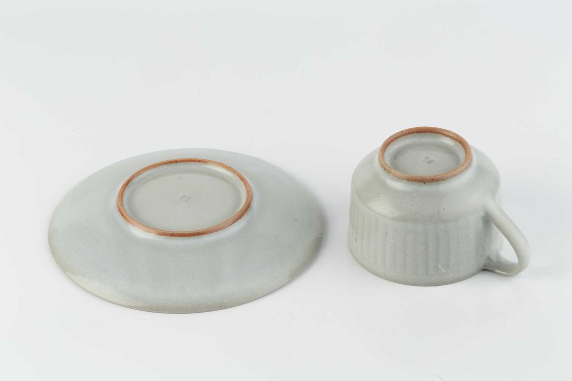 Rupert Spira (b.1960) Cup and saucer pale glaze and with a faint incised pattern both with impressed - Image 3 of 4
