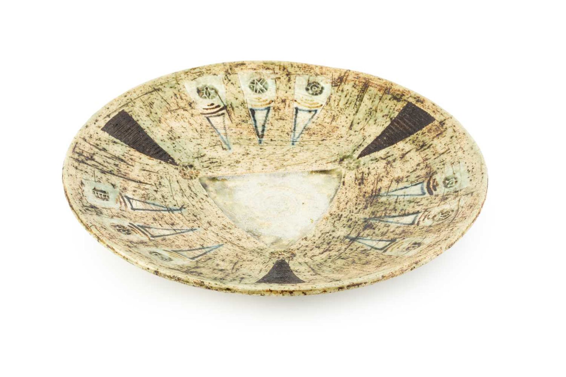 Cornish School Troika style dish with abstract patterns impressed potter's seal 26cm diameter.