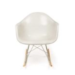 Charles and Ray Eames A RAR Rocking Chair with a white moulded polypropylene seat, on a chrome