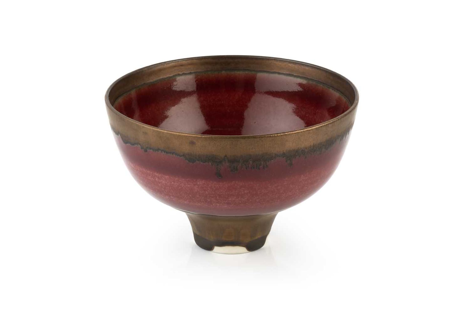 Peter Wills (b.1955) Footed bowl porcelain, with dripped manganese rim and copper red glaze signed