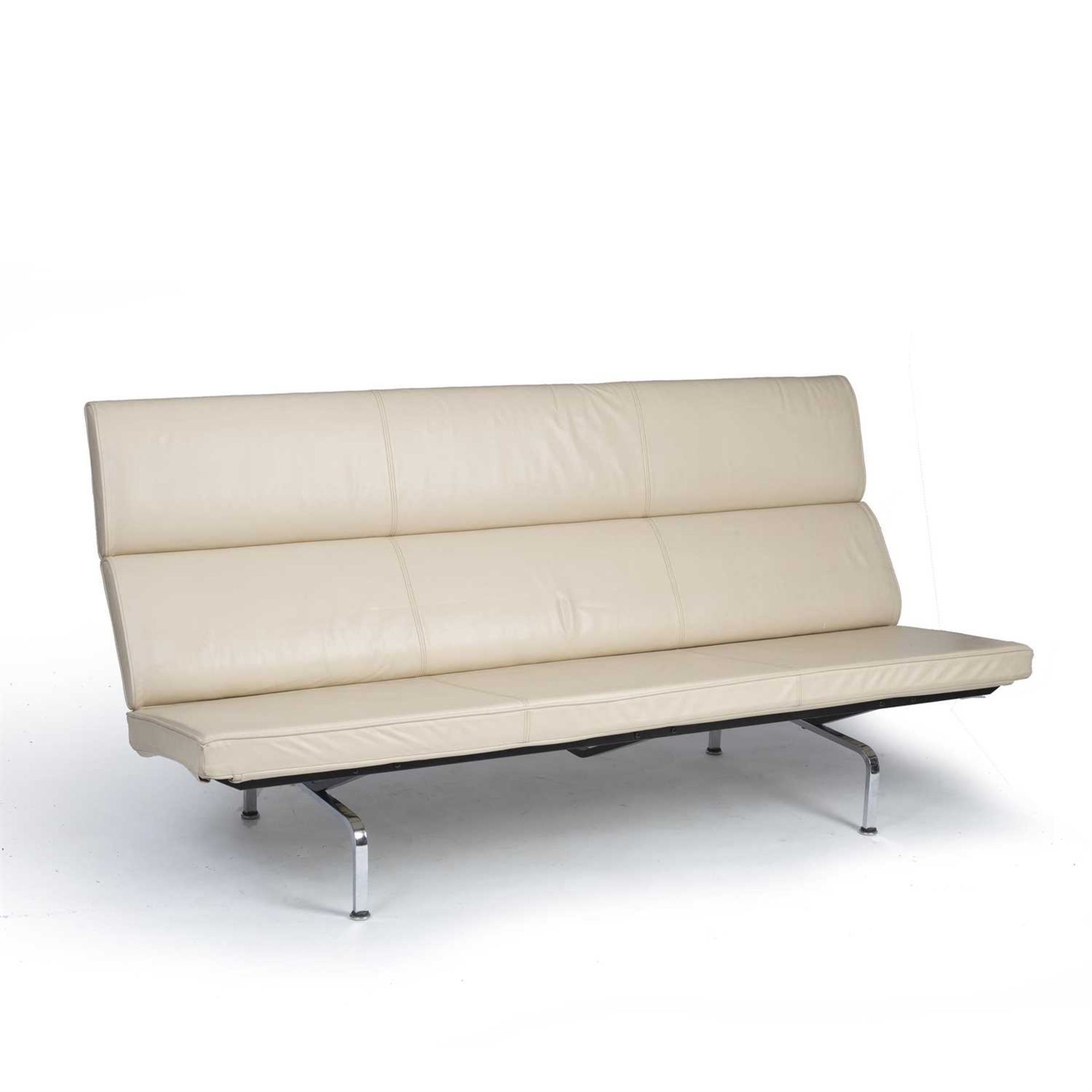 Charles and Ray Eames for Herman Miller Compact sofa upholstered in cream leather, over chromed