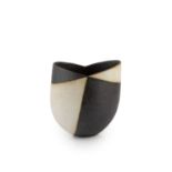 John Ward (b.1938) Vessel black and white, of asymmetrical form impressed potter's seal 15.5cm high,