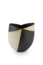 John Ward (b.1938) Vessel black and white, of asymmetrical form impressed potter's seal 15.5cm high,