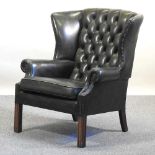 A wing armchair