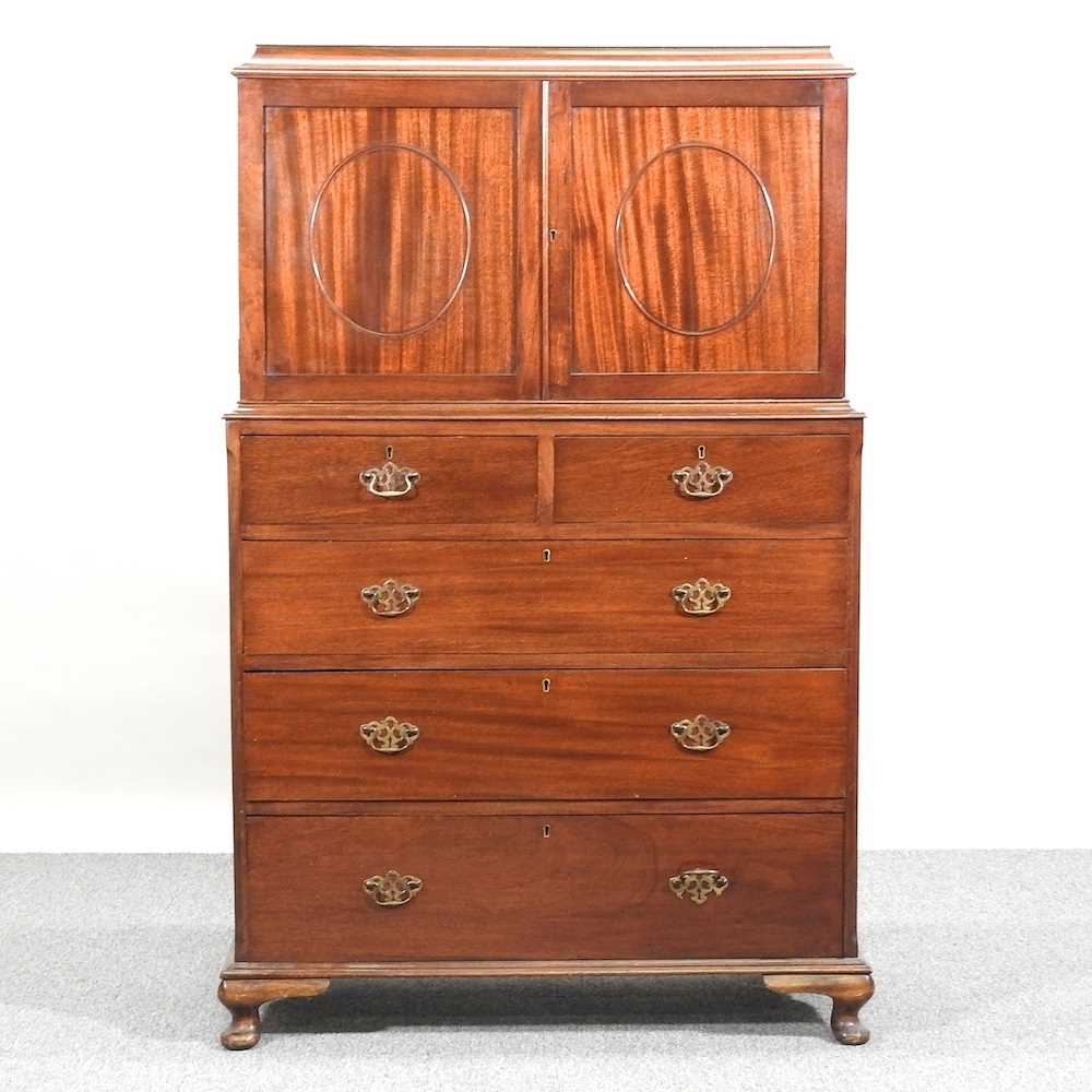 A cabinet on chest