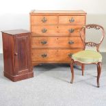 A chest, chair and cabinet