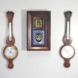 Two barometers and a clock