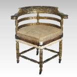 A gilt corner chair