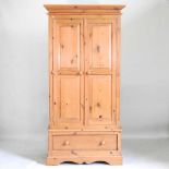 A pine single wardrobe