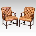 A pair of armchairs