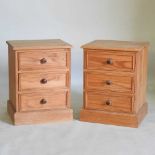 A pair of bedside chests