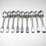 Nine silver table spoons