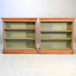 A pair of burr oak bookcases