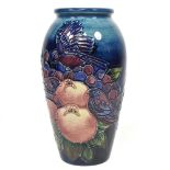 A Moorcroft pottery birds and fruit pattern vase