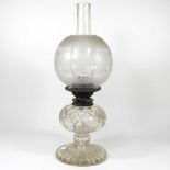 A cut glass oil lamp