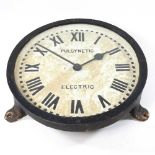 A cast iron Pulsynetic electric wall clock