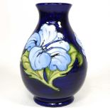 A Moorcroft pottery Hibiscus pattern vase