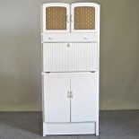 A vintage white larder cabinet