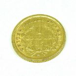A gold dollar coin