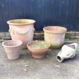 A collection of terracotta pots