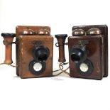 Two vintage wooden phones