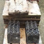 A quantity of patio slabs and lawn edge tiles