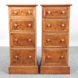 A pair of walnut bedside chests