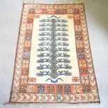 A Persian woollen rug