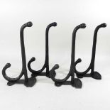 A set of four coat hooks