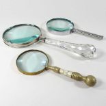 Three magnifying glasses