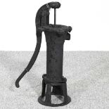 A cast iron garden pump