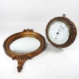 A barometer and mirror