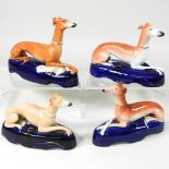 Four Staffordshire greyhounds