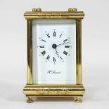 A brass cased carriage clock