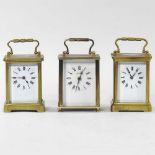 Three carriage clocks