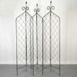 A set of three folding trellis