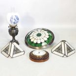 Three lamps and a barometer