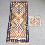 A kilim runner, and another