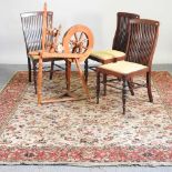 A 19th century spinning wheel, chairs and rug