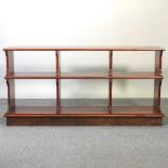 A Victorian and later walnut open bookcase