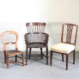 An Edwardian windsor armchair and two other chairs