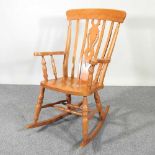 A beeck rocking chair and pine table