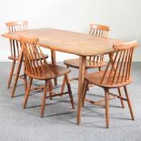 A 1960's Ercol light elm dining table