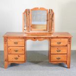 A pine dressing table and mirror