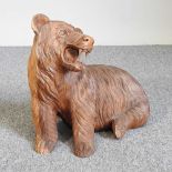 A Black Forest style carved wooden bear