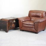 A Chinese hardwood box and leather armchair