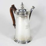 A Queen Anne Britannia standard silver chocolate pot