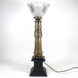 A brass fireman's hose table lamp